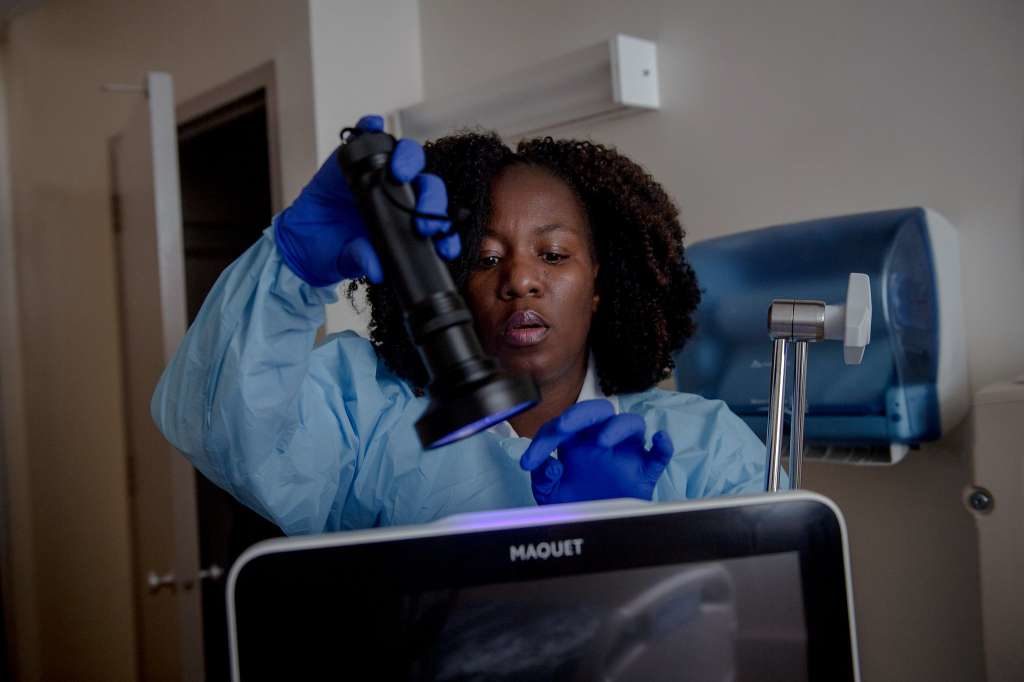 Nurse With UV Lamp