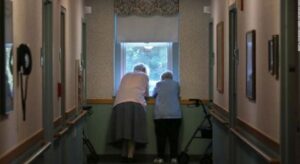 Two Old Women At Window