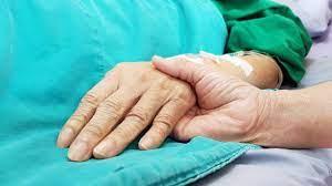 Holding Patients Hand