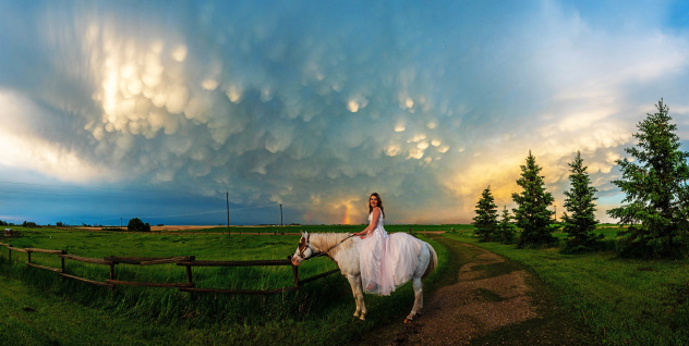 Graduate In Front Of Mammatus Clouds