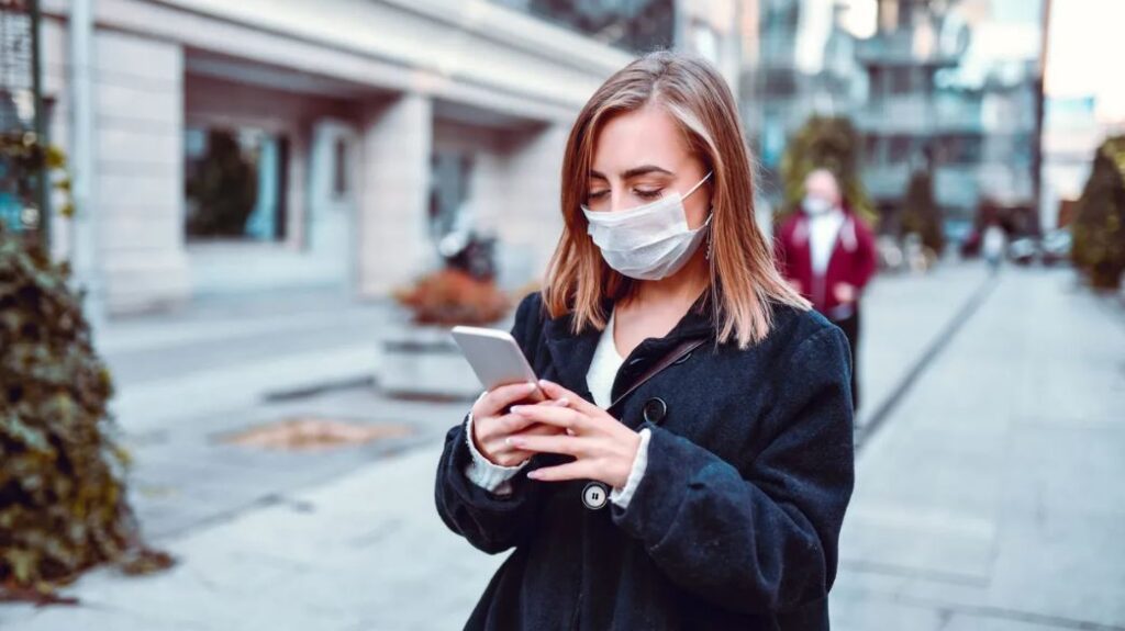 Masked Girl On Phone