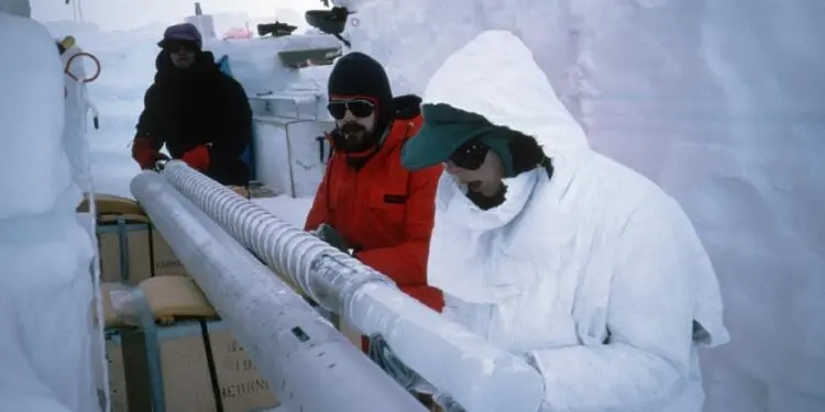 Scientists Examining Ice Core Sample