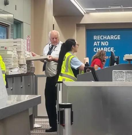 Pilot Serving Pizza